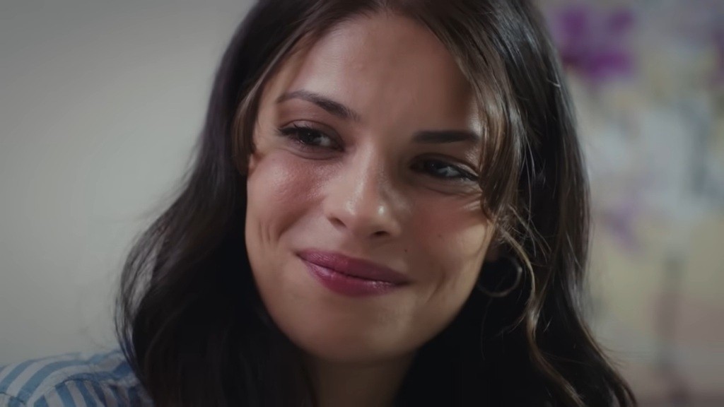 Zbliżenie na twarz uśmiechniętej Ayse.