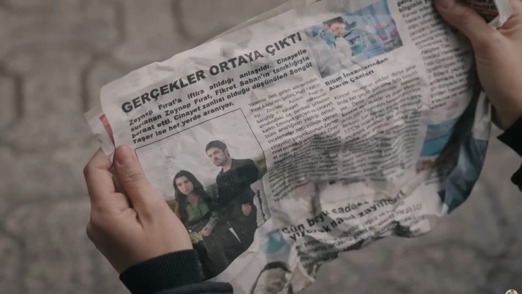 Artykuł w gazecie, opatrzony zdjęciem Zeynep i Halila.